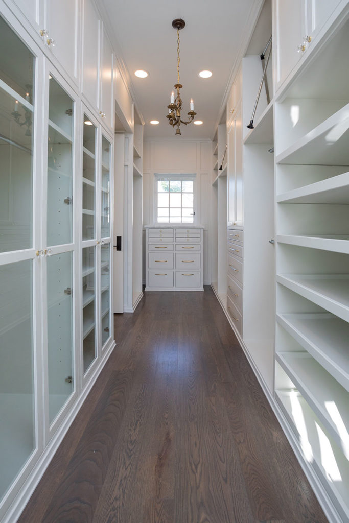 custom California style closet, master closet with custom built cabinets