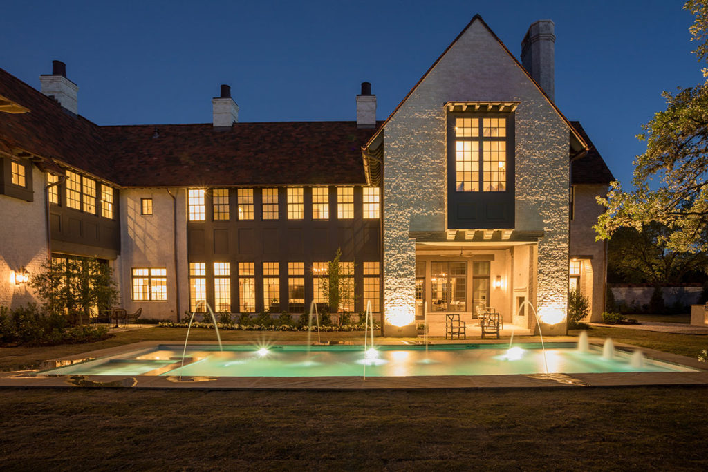 Mirador-Builders-River-Oaks-Estate, back view at night shows custom lighting