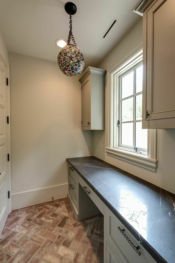 custom home with small office off the kitchen