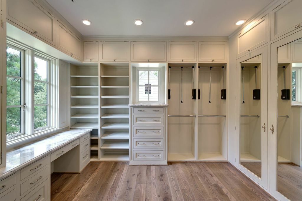 custom home design with large master closet, wood floors, custom built-ins