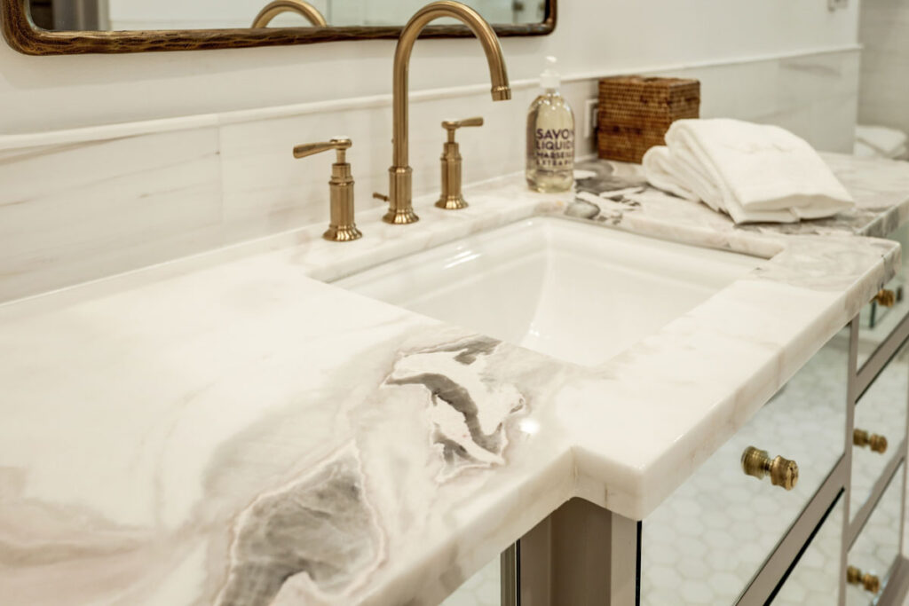 thick marble countertop in a custom bath